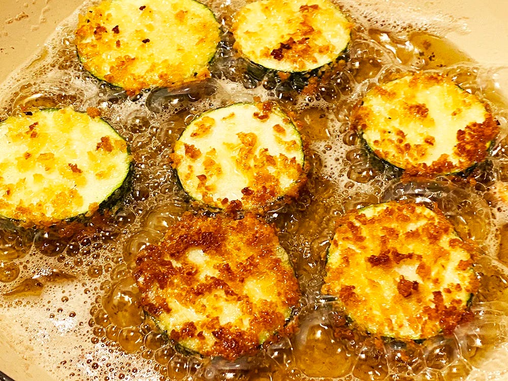 Zucchini frying in the pan