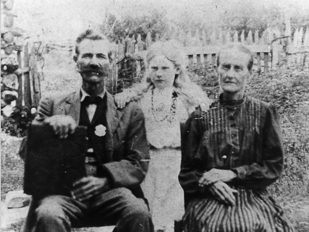 Joseph Walker, Eliza Jane Evans, and possibly Bertha or a grandchild