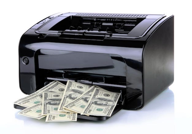 Photo printer printing fake dollar bills isolated on white