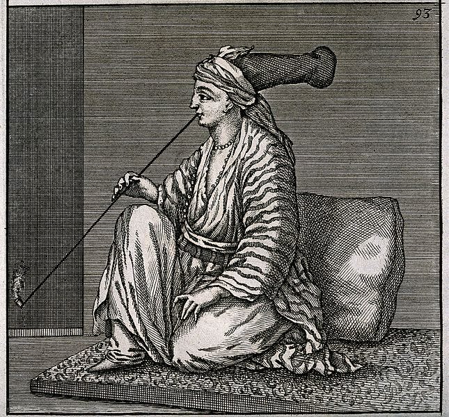 A 1702 woodcut of a Jewish woman wearing a turban and smoking opium.