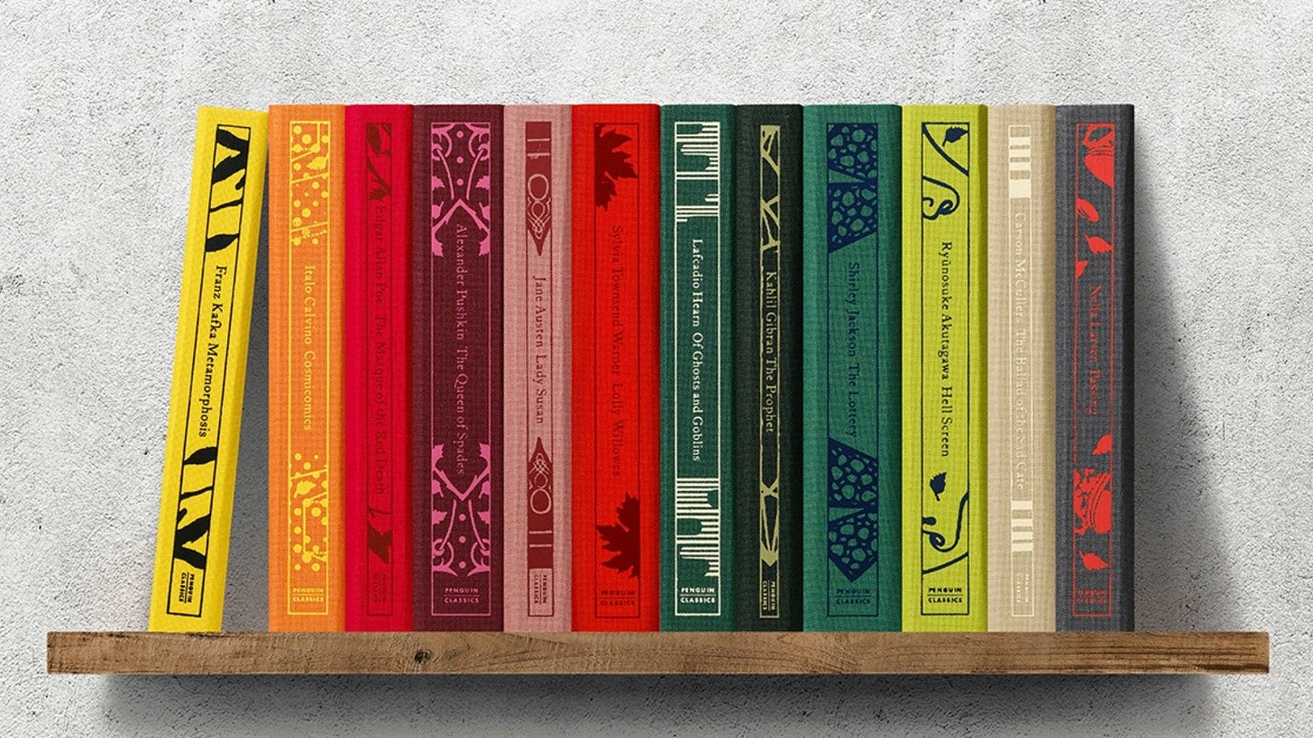Colorful clothbound Penguin Classics books displayed upright on a wooden shelf against a light concrete wall. Colorful clothbound Penguin Classics books displayed upright on a wooden shelf against a light concrete wall.