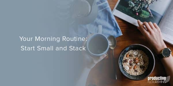 Someone wearing a watch sits at the table, where we can see their breakfast, coffee, and a magazine. Text Overlay: Your Morning Routine: Start Small and Stack