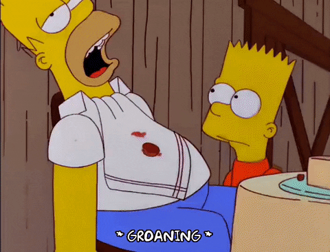 Bart trying to throw a piece of steak into Homer's mouth, it bounces out as he groans