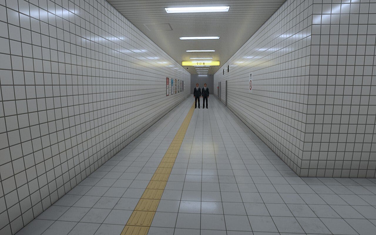 Two men standing in the corridor