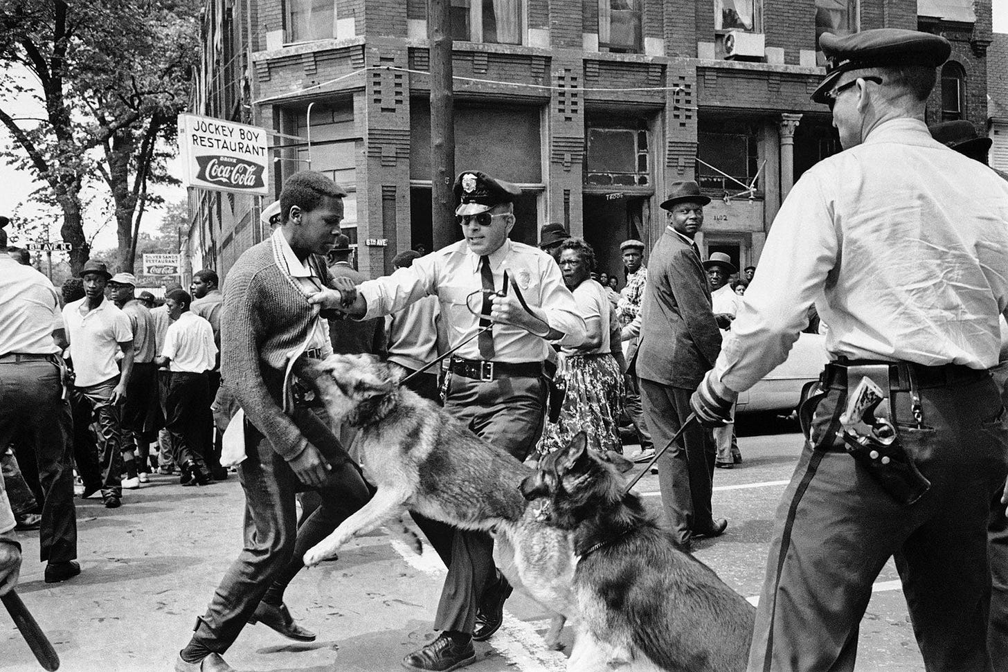Birmingham civil rights history: The backstory behind the famous photo of  Walter Gadsden, officer Dick Middleton, and his police dog.