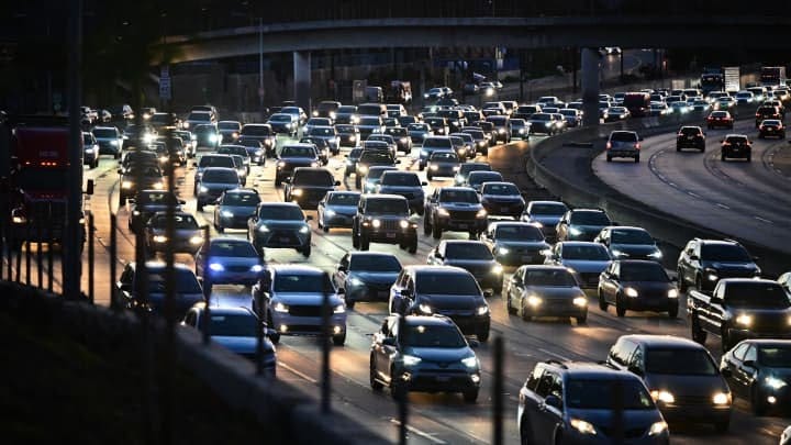 Cars make their way in traffic on a Los Angeles freeway on January 25, 2024. 