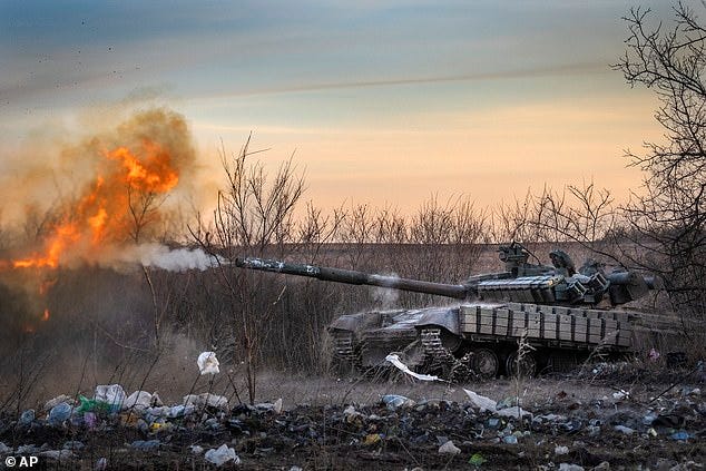 A Ukrainian tank of the 17th tank brigade fires at the Russian positions in Chasiv Yar, Feb 29