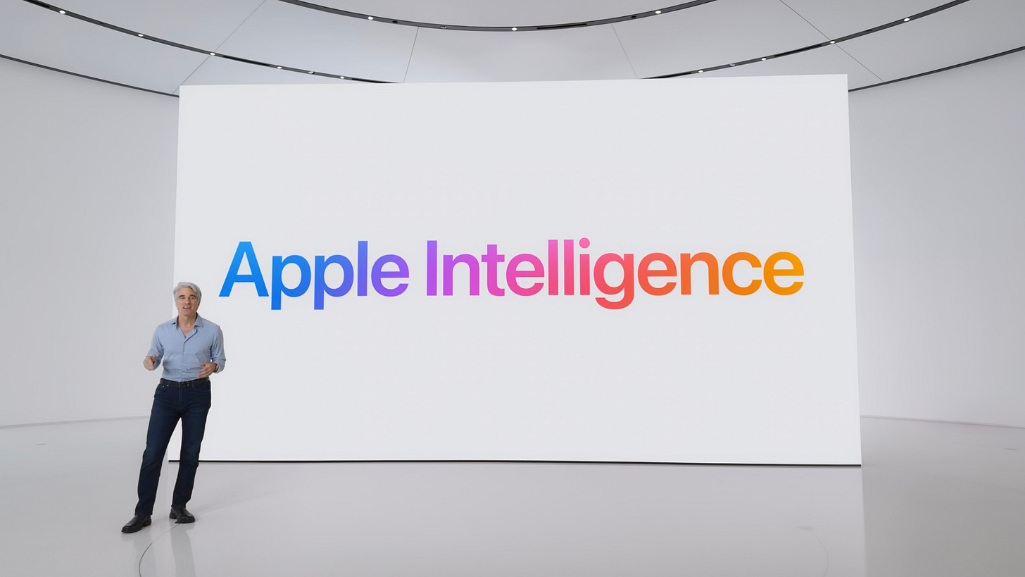 A still from Apple’s keynote showing Craig Federighi, Apple’s Senior Vice President of Software Engineering in front of a screen with the words ‘Apple Intelligence’