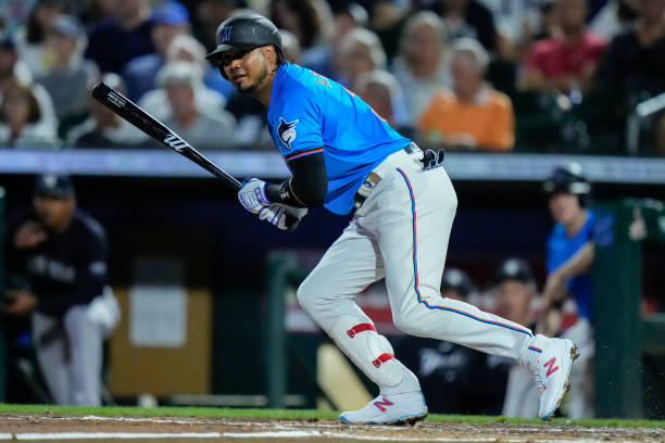 Luis Arraez of the Miami Marlins at bat during a spring training game against the New York Yankees at Roger Dean Stadium on March 04, 2024 in...