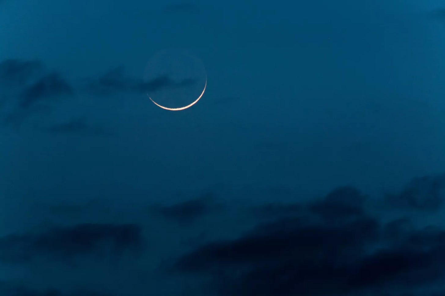 New moon with earthglow