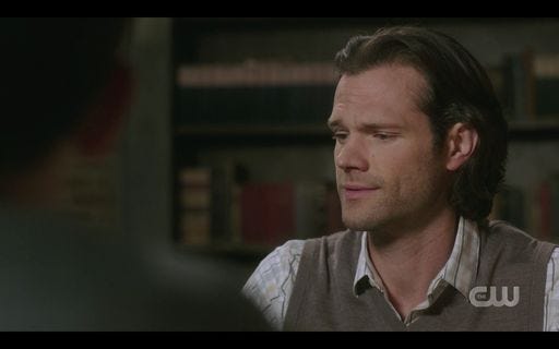 Sam Winchester scoffs at sloppy birthday cake.