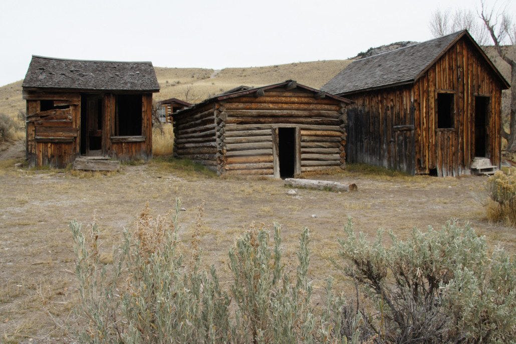 The collapsing remains of cabins in "Bachelor's Row."