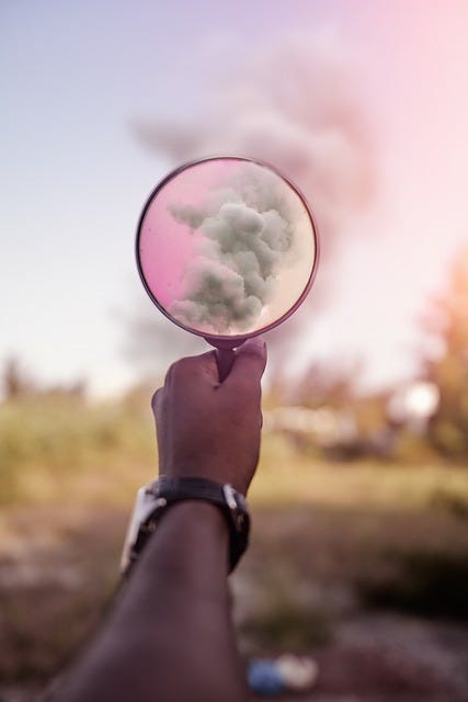 Looking at smoke through a magnifying glass