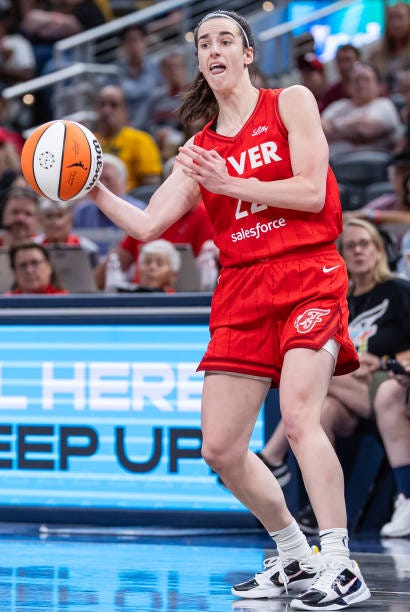 Caitlin Clark of the Indiana Fever passes the ball during the second half against the New York Liberty at Gainbridge Fieldhouse on July 6, 2024 in...