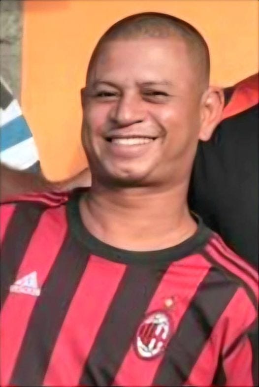 May be an image of 1 person, smiling and playing soccer