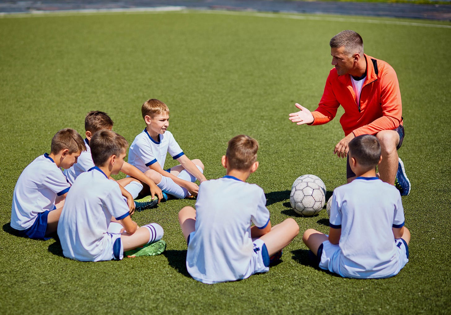 5 Qualities of Successful Football Coaches in 2025