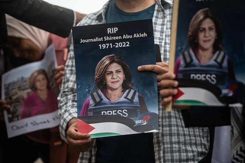 May be an image of ‎4 people and ‎text that says '‎JournalistShireenAbuAkleh Journalist Shireen Abu Akleh RIP 1971-2022 noEes مد ￥ DDESS PRESS‎'‎‎