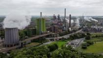 FILE - A steel mill of Germany's biggest producer thyssenkrupp Steel Europe is under steam in Duisburg, Germany, May 23, 2023. The European Union has been at the forefront of the fight against climate change and the protection of nature for years. But it now finds itself under pressure from within to pause new environmental efforts amid fears they will hurt the economy. (AP Photo/Martin Meissner, File)