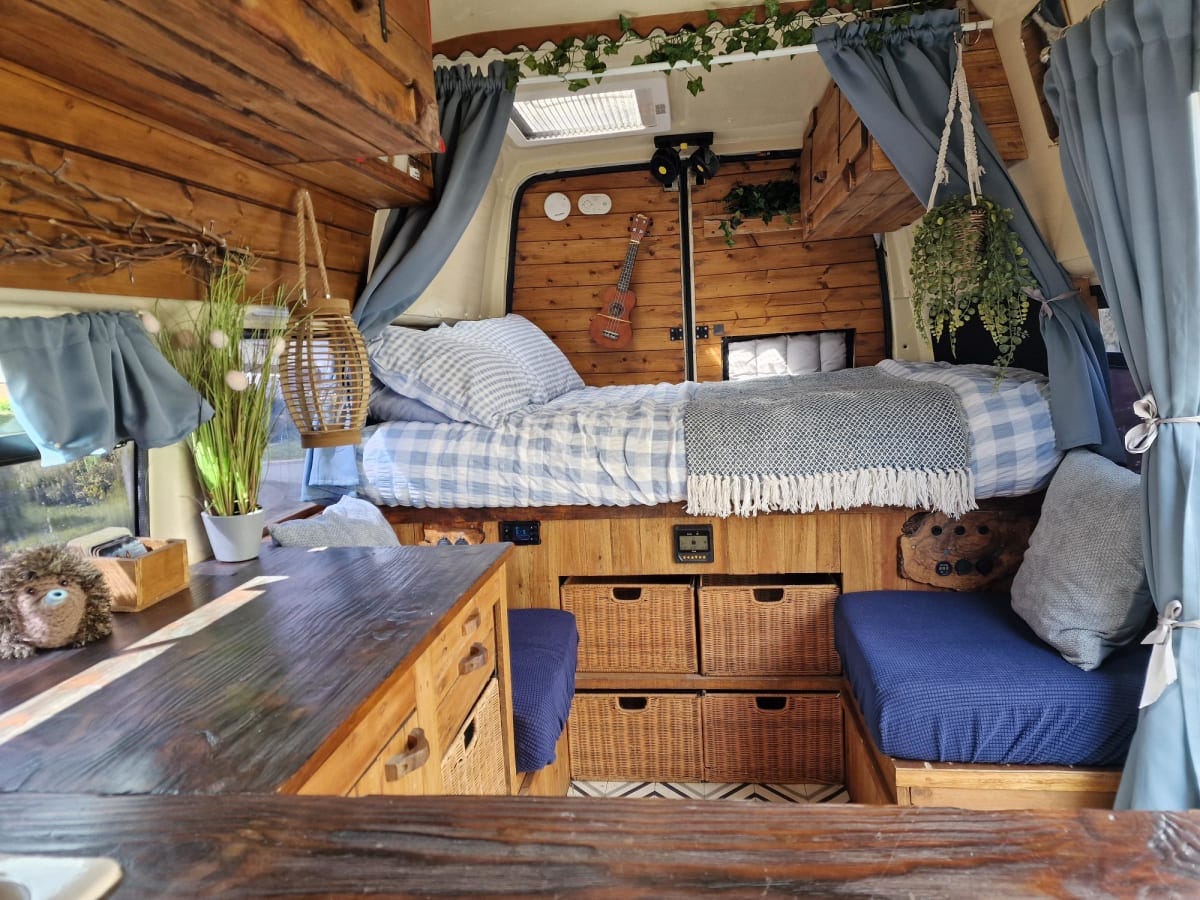 Wooden interior of a charming camper van.