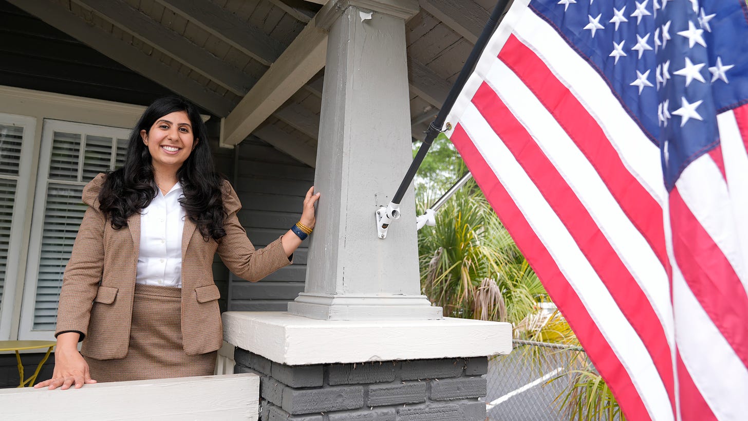 Florida state Rep. Anna Eskamani poses out front of her office.