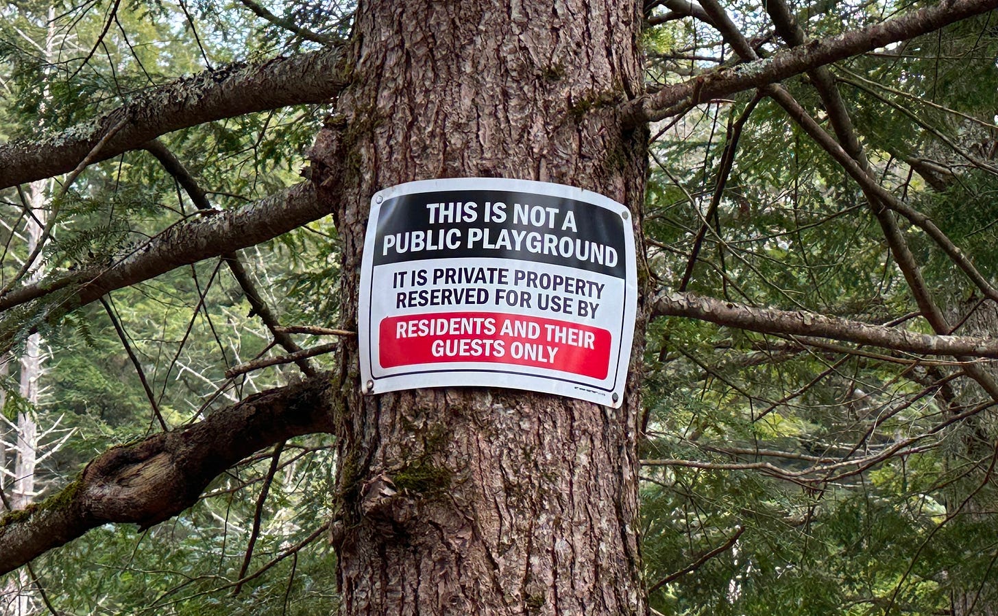 A sign indicating "This is Not a Public Playground."