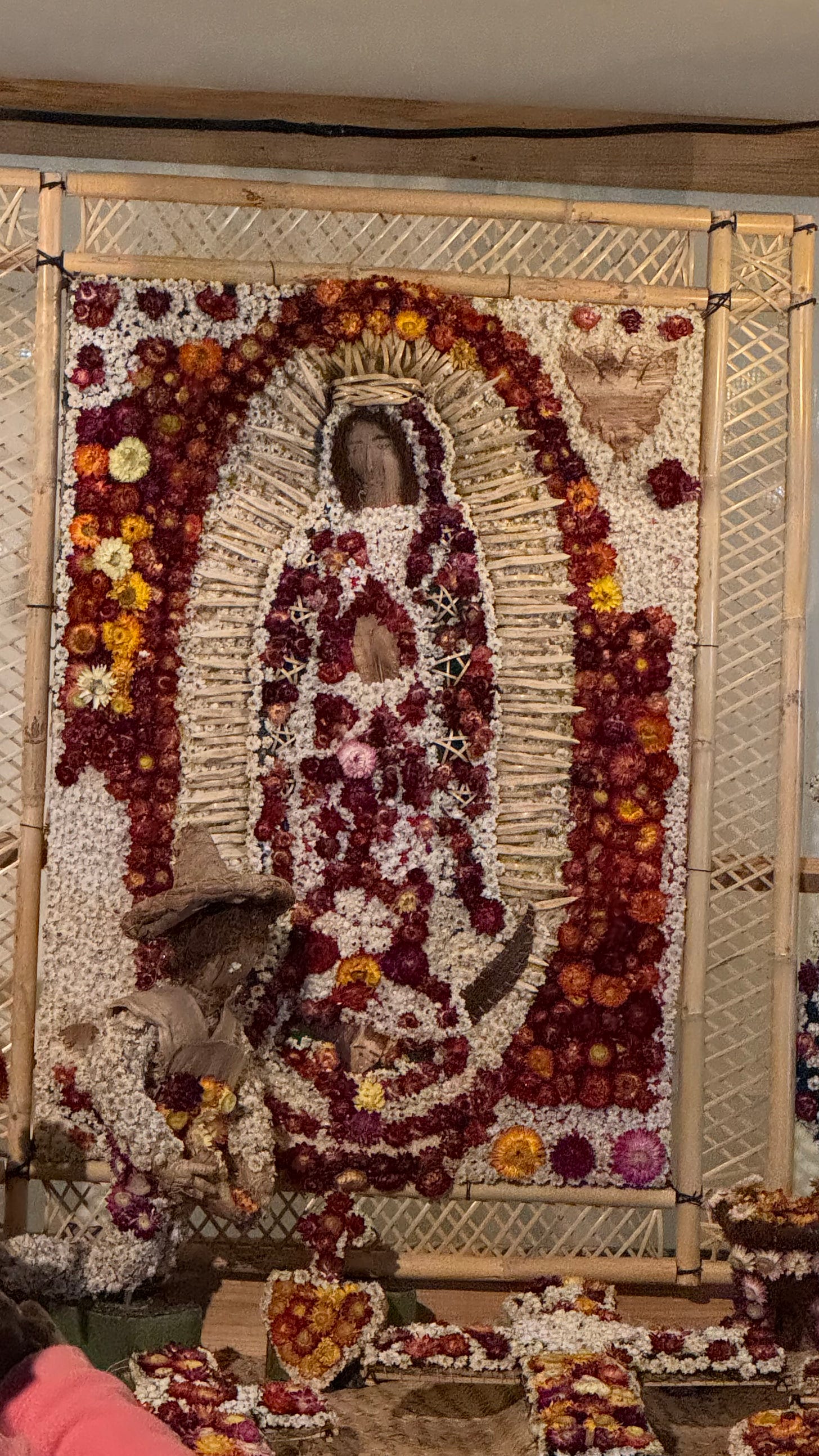 A dried flower Virgin Mary.