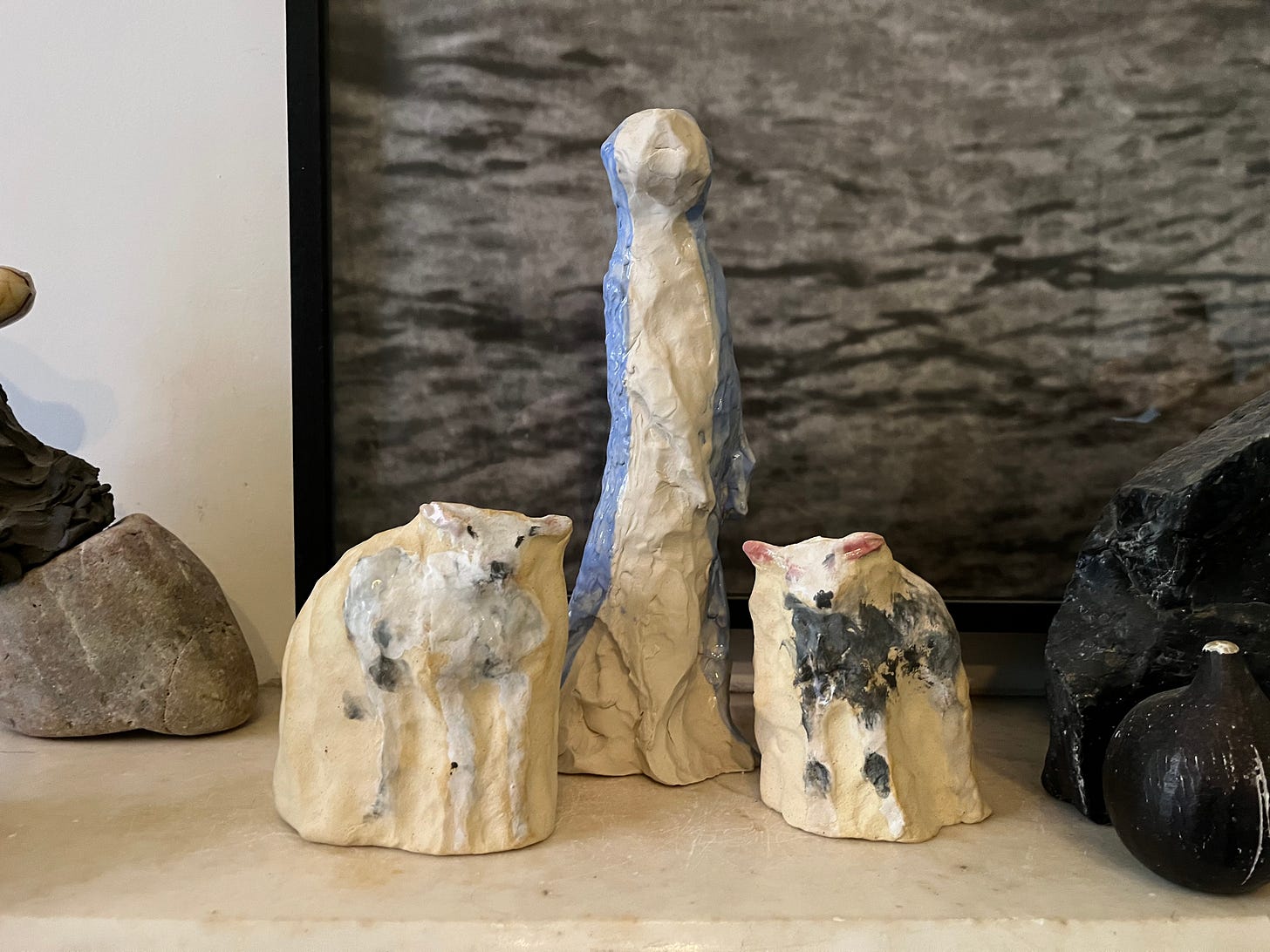 Two sculptures in the shape of sheep.