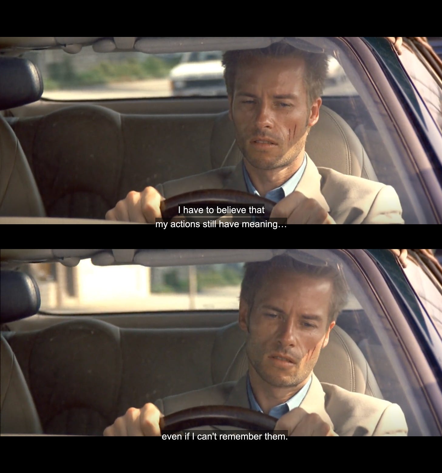 Memento scene with Leonard in the car, thinking: "I have to believe my actions still have meaning, even if I can't remember them."
