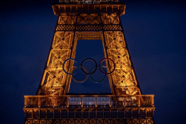 The Olympic rings are seen on the Eiffel Tower ahead of the start of the Paris 2024 Olympic Games on June 12, 2024 in Paris, France. The 2024 Summer...