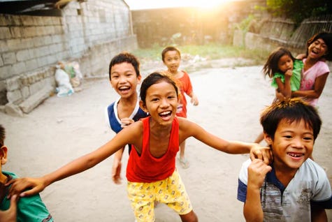 A group of children playing Filipino games Langit Lupa 