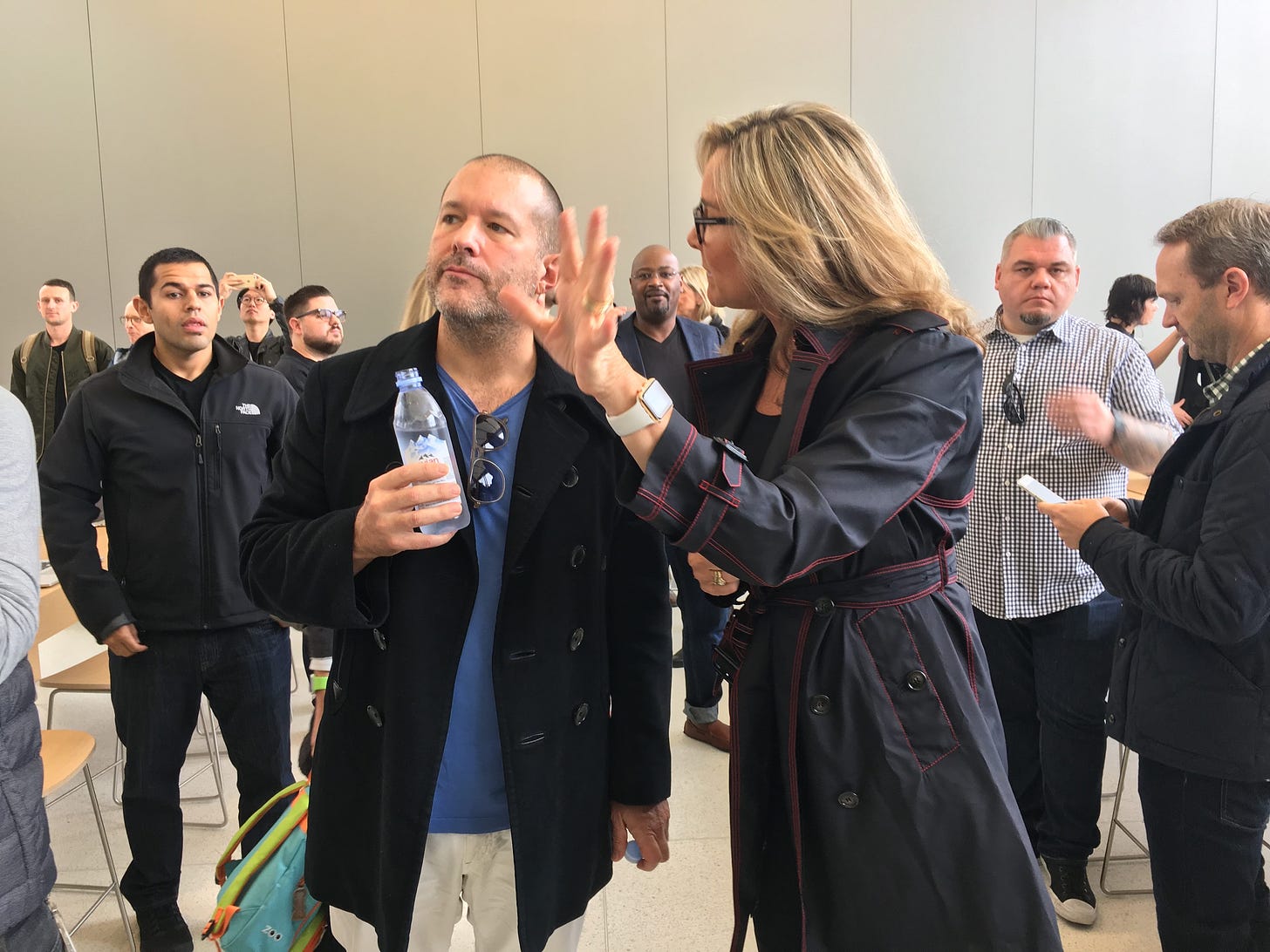 Jony Ive and Angela Ahrendts deep in discussion during the grand opening of Apple Union Square.