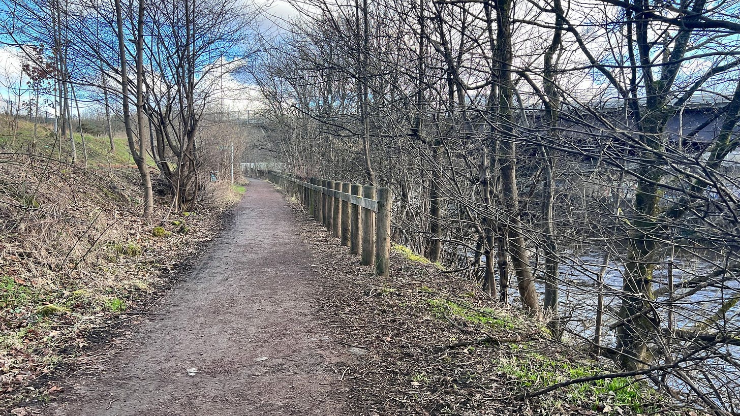 The trail turned to gravel and felt nicer underfoot but the noise of roads and sirens was never far away