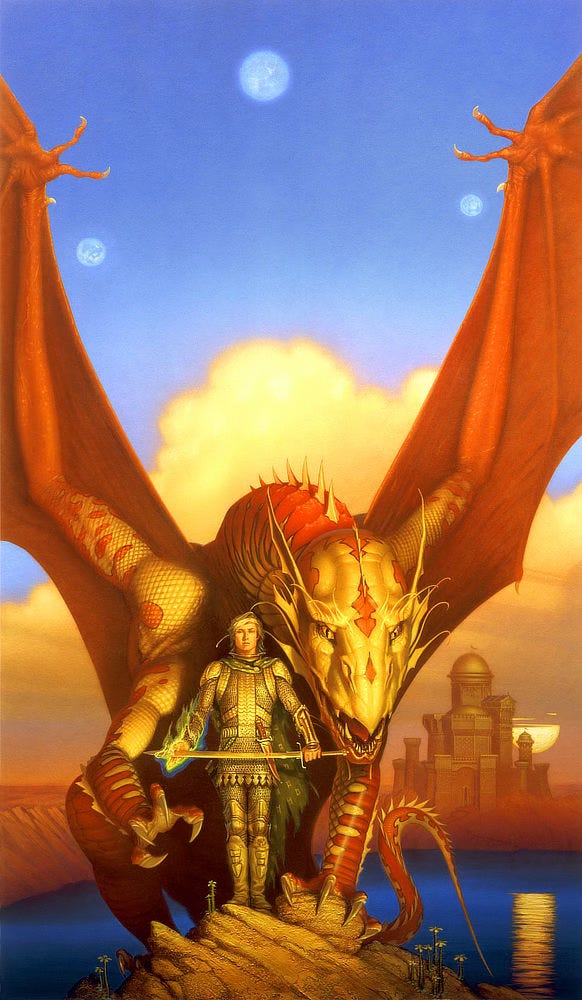 A man in chain armor and tattered cloak with a bandage wrapping his head holds out a sword at waist height. Flame licks the blade as his right hand ignites in blue green fire. A red and gold dragon perches just behind him with its massive aquiline head poised just over his shoulder as its swings spread wide. Its left foreclaw grips the rock on which he stands while its other claw extends around the man to envelop him in its defense. The dragon's eyes are vertical slits against a fiery glow. Behind them a blue crystalline lake leads to a castle topped with wide bronze domes on the opposite shore. Haze streaks the top of a moon hanging low and golden just above the horizon. Three pearlescent moons glow blue in the sky above, framed by the dragon's wings and billowing clouds.