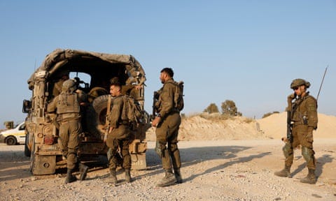 Israeli soldiers at the country’s Gaza border