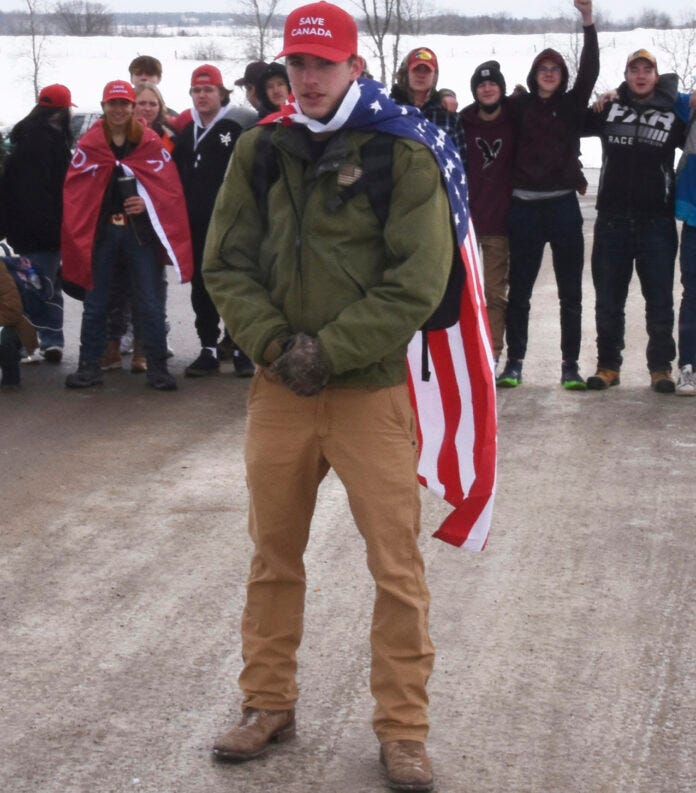 Josh Alexander pictured at a February 2022 protest at Opeongo High School, where he was a student.