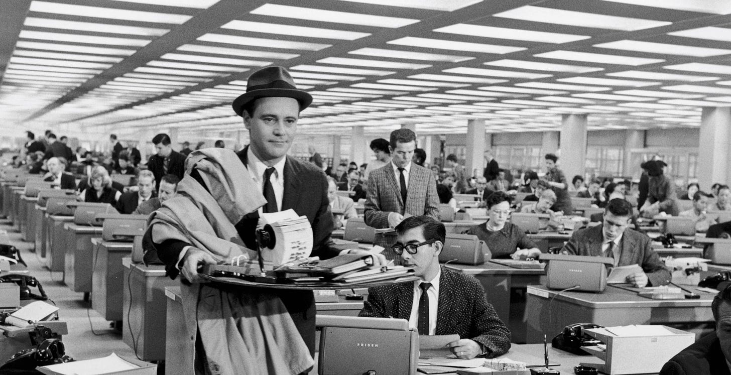 Jack Lemmon, in a respectable suite and hat, carries his possessions, including a Rolodex, a blotter and so on, through the huge, regimented office at the insurance company he works for, in Billy Wilder's 1960 film 'The Apartment'