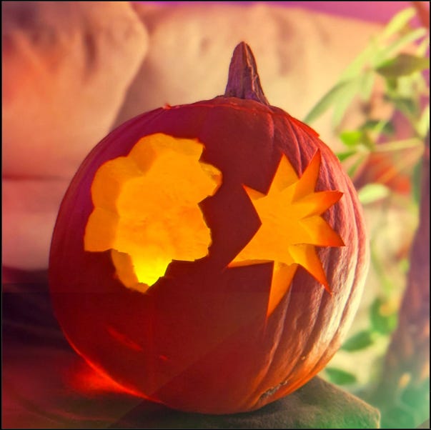 Carved pumpkin with a rounded cloud shape on the left and a sharper star-like shape on the right with the text: One of the shapes on this pumpkin is called kiki and the other one is called boo-ba. Which is which?