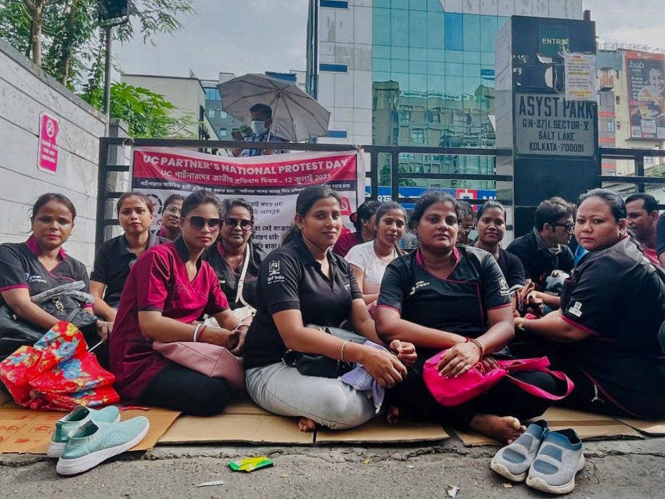 Women protesting the Urban Company