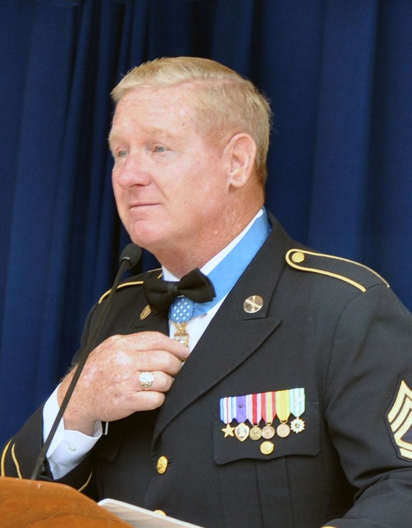 Headshot of Davis. He is in uniform and wearing his Medal.