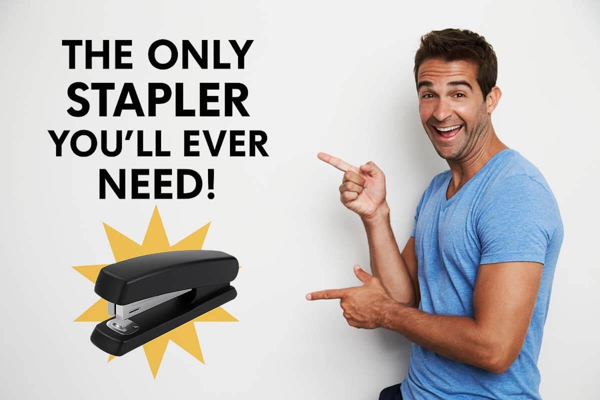 Grinning man pointing at stapler