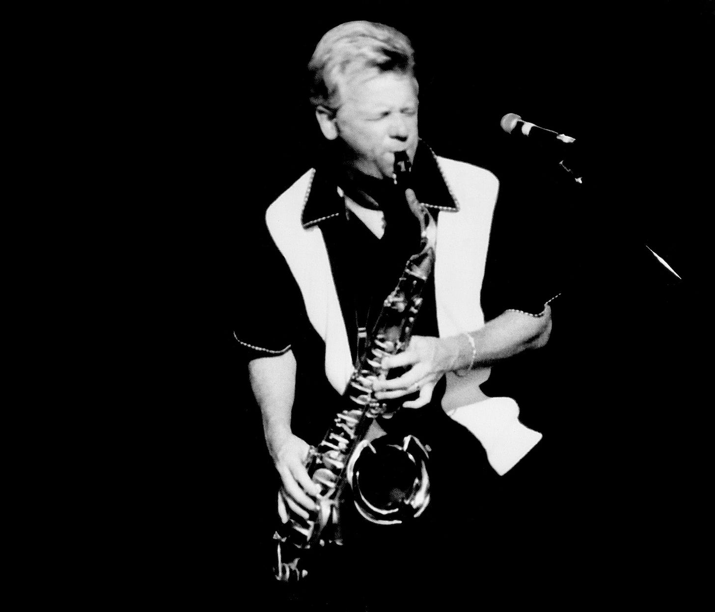 Johnny Colla playing the saxophone