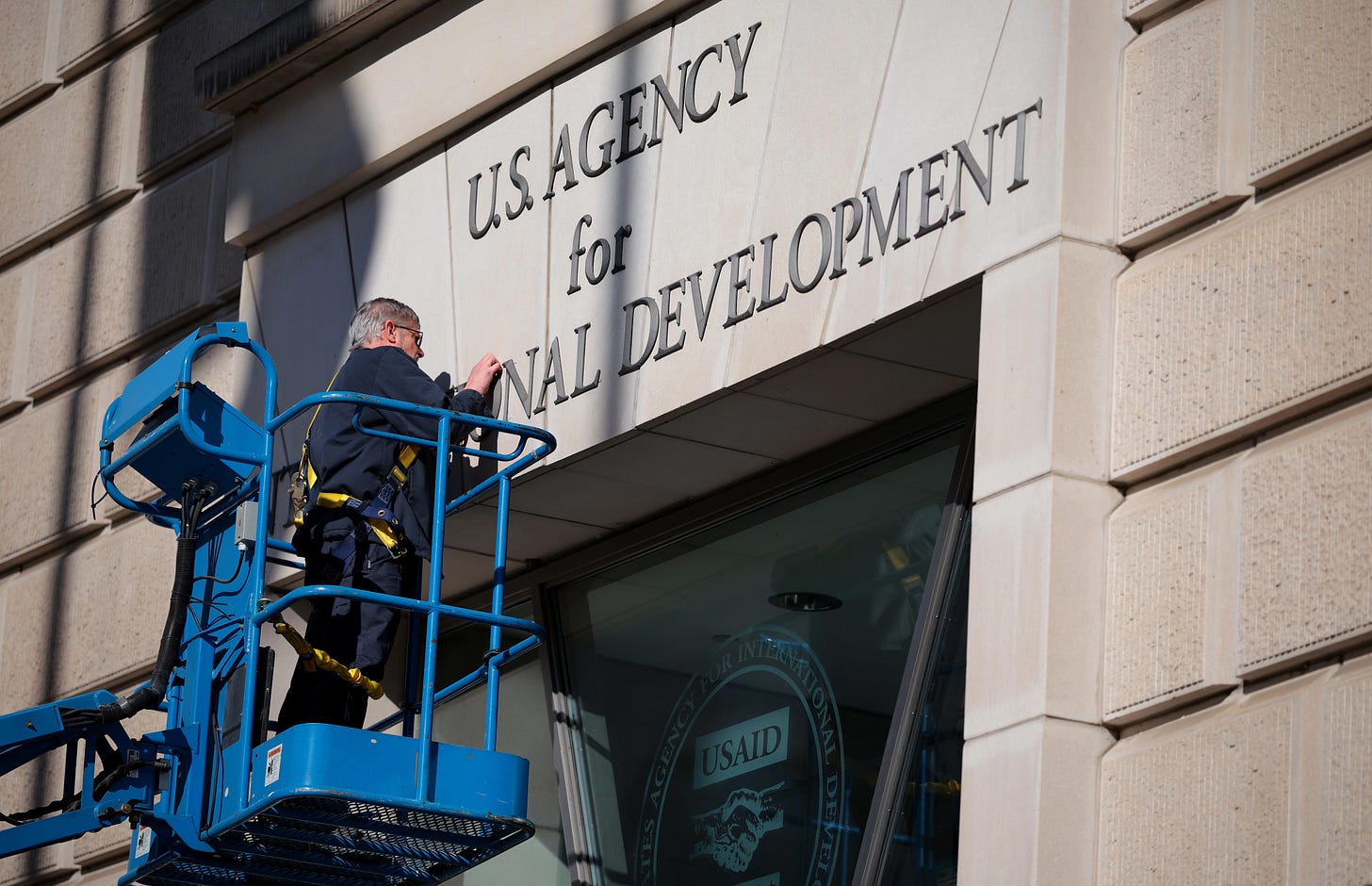 USAID signs removed from HQ as judge puts 'limited' block on Trump bid to  dismantle agency