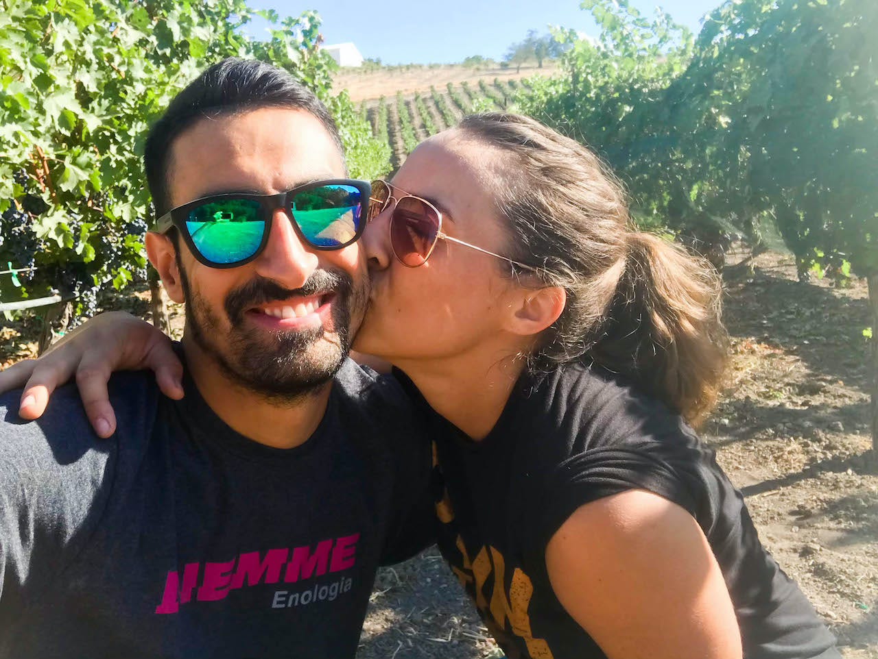 winemaking couple in the vineyard