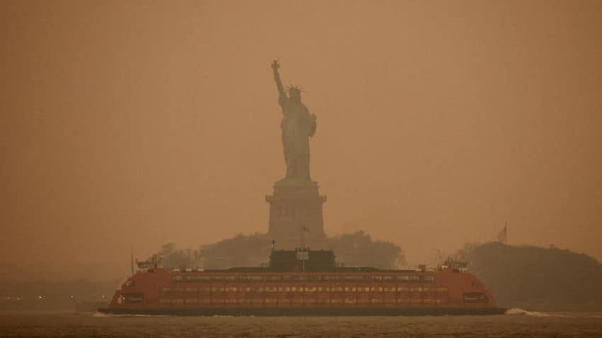 May be an image of the Statue of Liberty