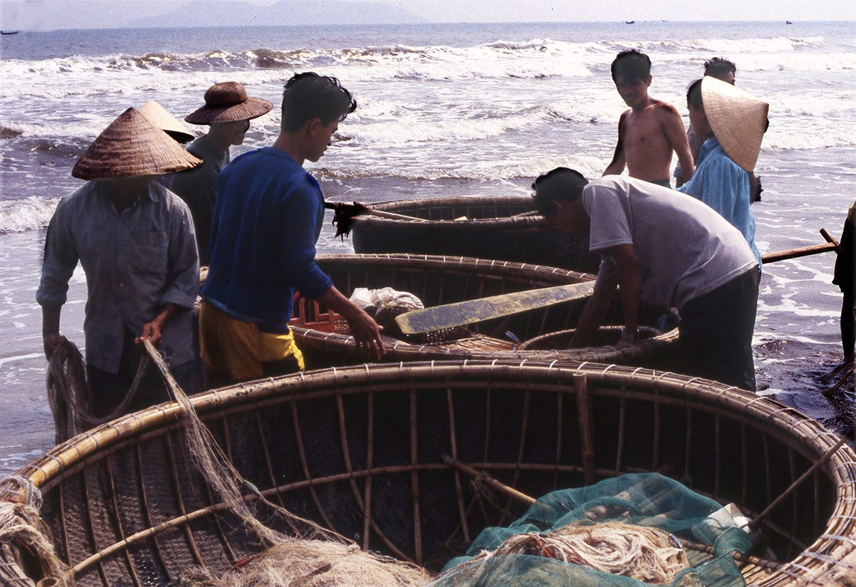 Men with fishing equipment