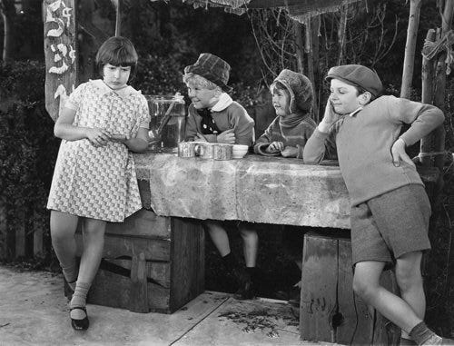 (L-R) Mitzi Green, Jackie Cooper, Robert Coogan, and Jackie Searl in a scene from Skippy