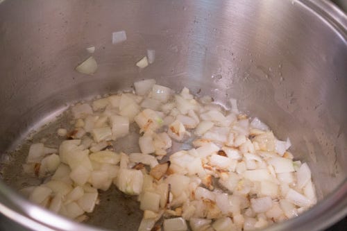 I like to cut the onion small enough it will cook into the soup base and not be noticeable. 