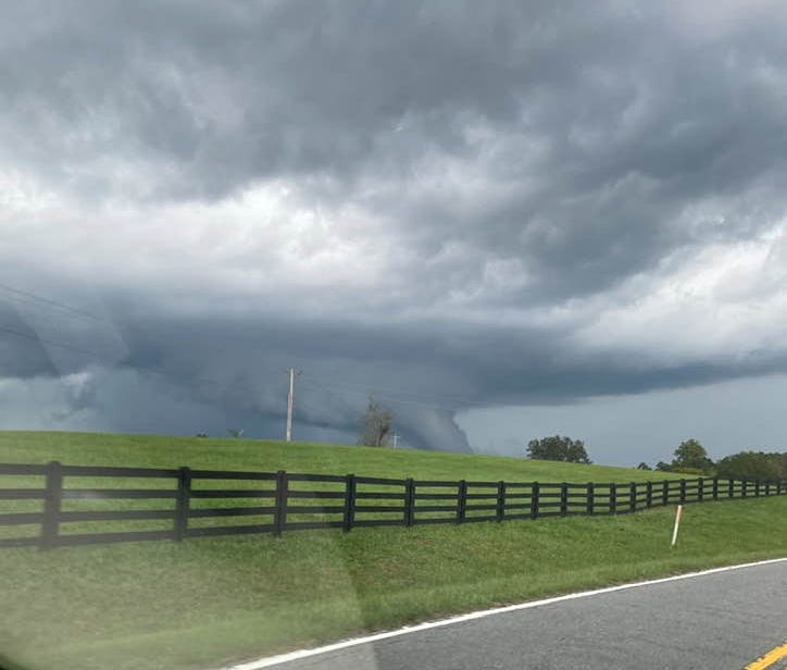 May be an image of tornado and road
