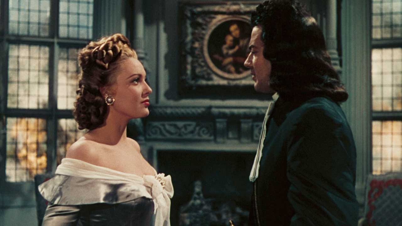 Linda Darnell as Amber St. Clair and Cornel Wilde as Bruce Carlton look longingly into each other’s eyes in 1947 film Forever Amber