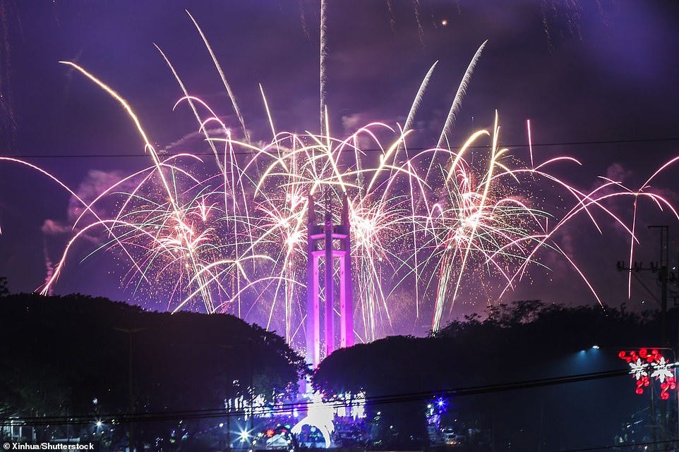QUEZON CITY: Fireworks explode to celebrate the New Year over Quezon City Memorial Circle in Quezon City, the Philippines, on December 31, 2024